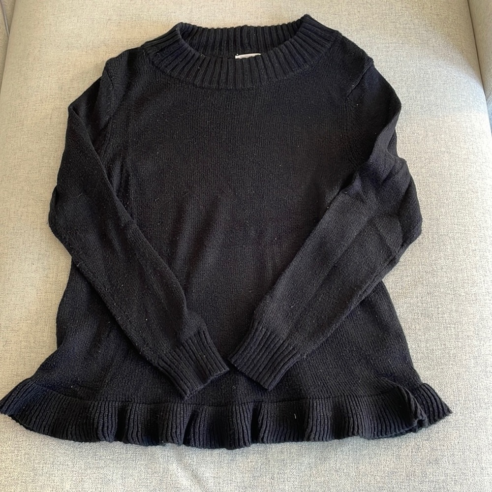 Black ruffle sweater. Normal wear- good condition